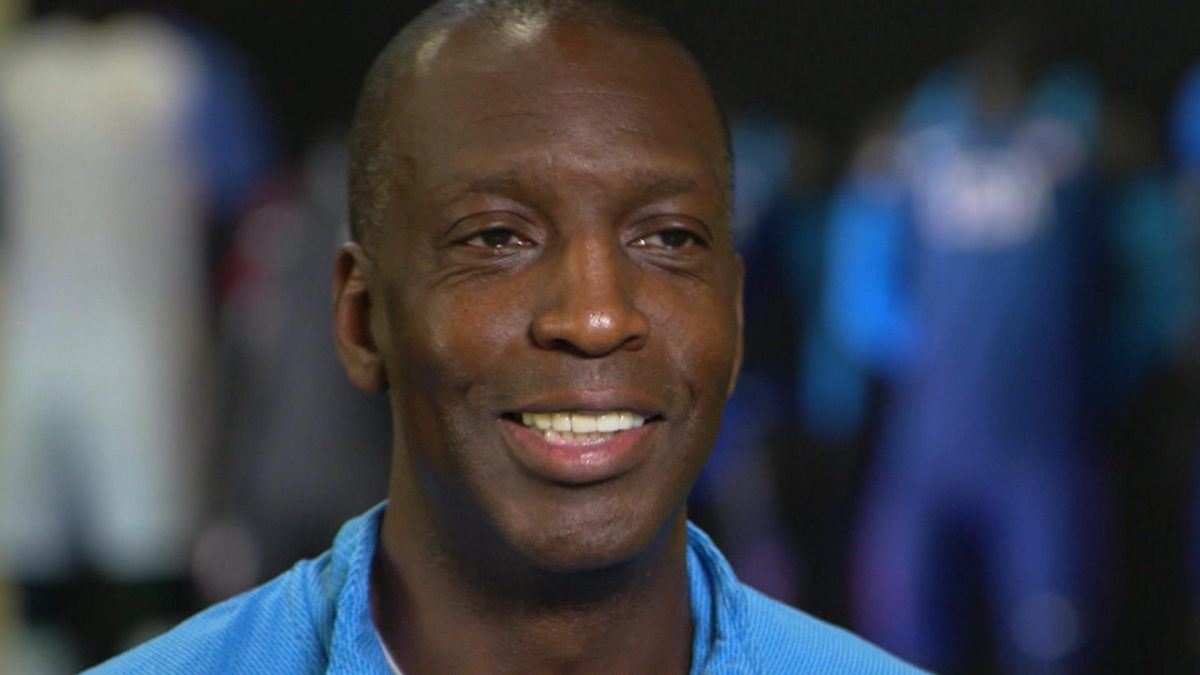 A picture containing person, indoor, person, smiling
Description automatically generated