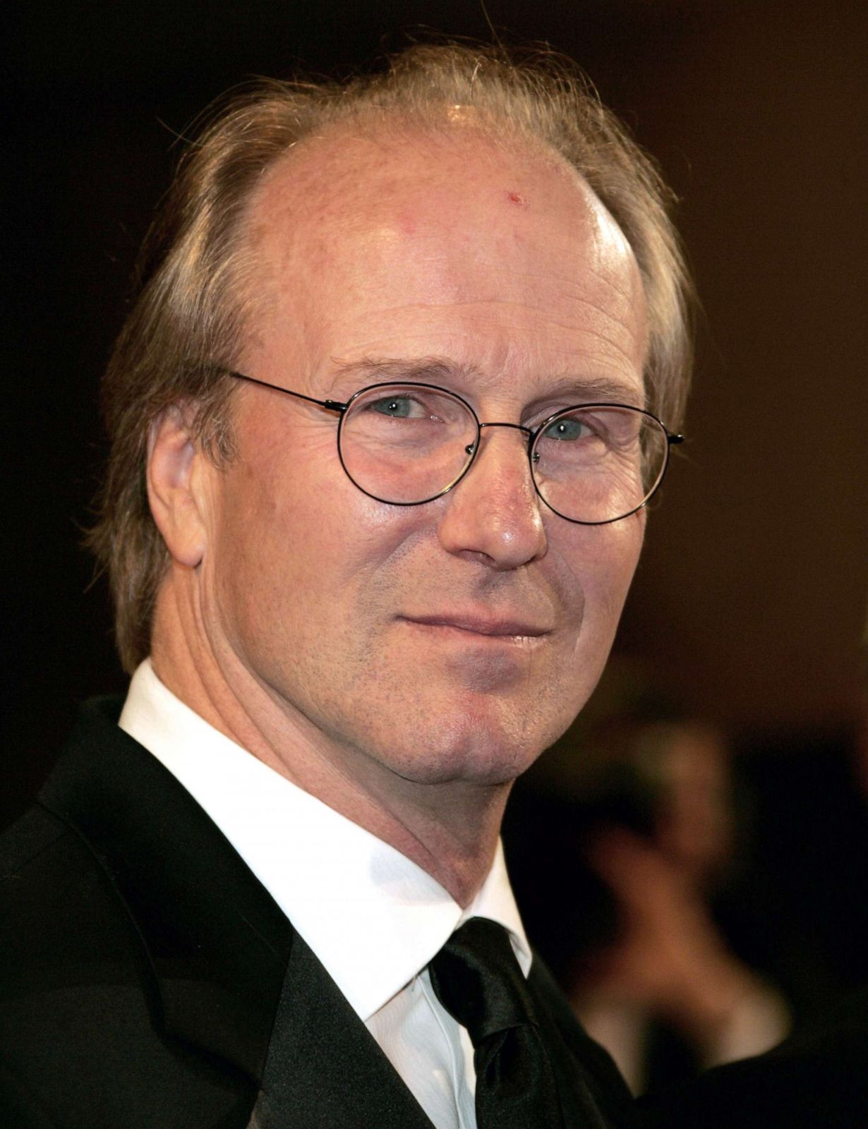 A person wearing glasses

Description automatically generated with medium confidence